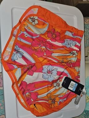 Nike Women’s Orange Floral Athletic Shorts with Pink & White Accents